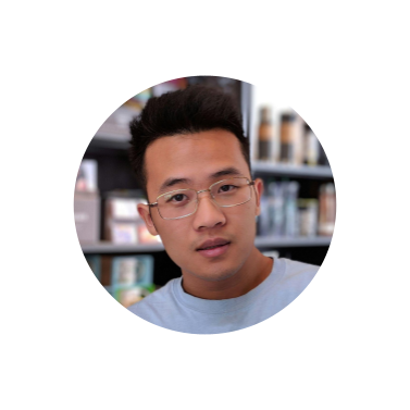 man in blue shirt with glasses